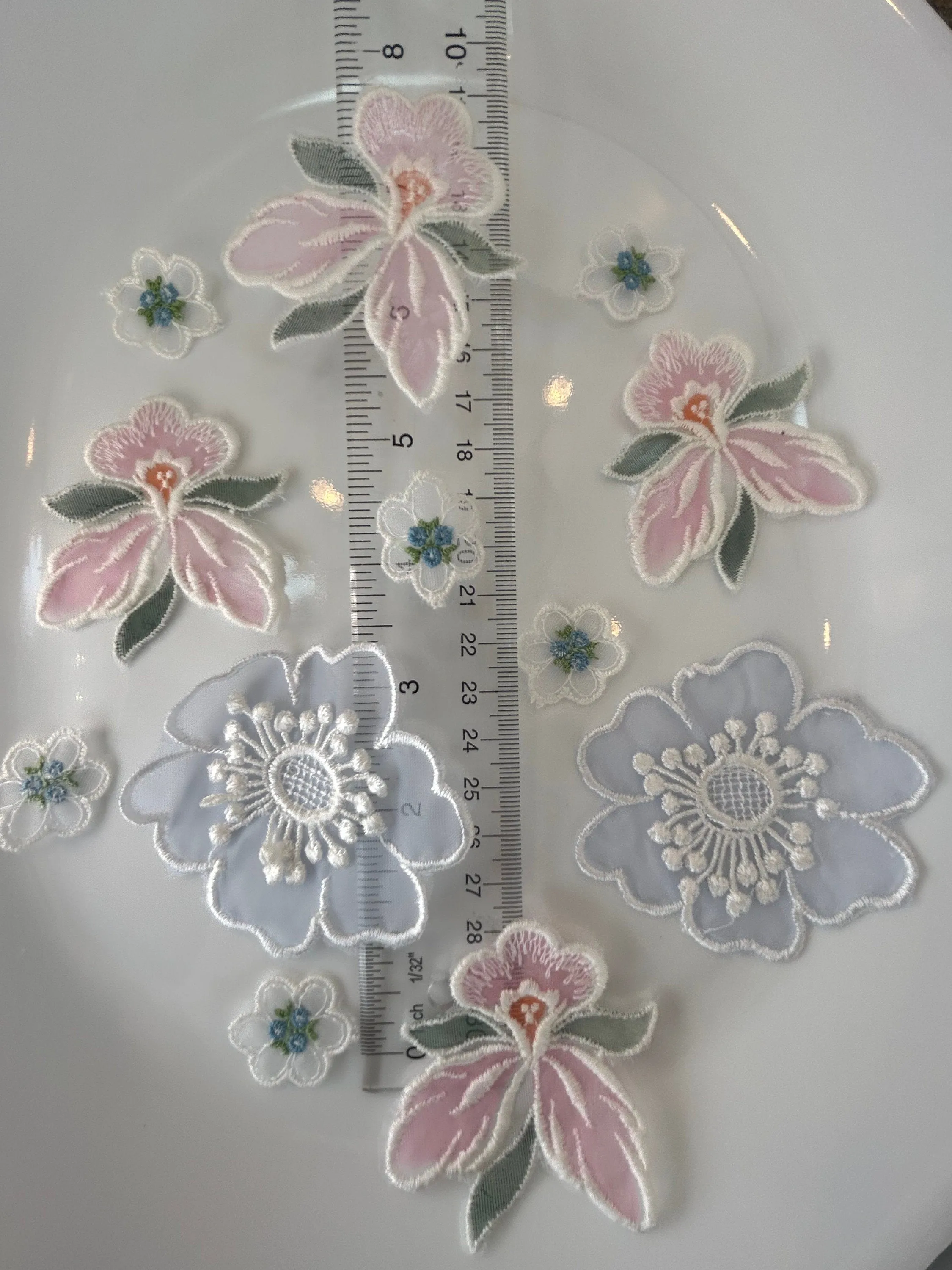 12 pieces FLORAL sew-on appliqués sheer blue, pink, tiny blue vintage lot #33