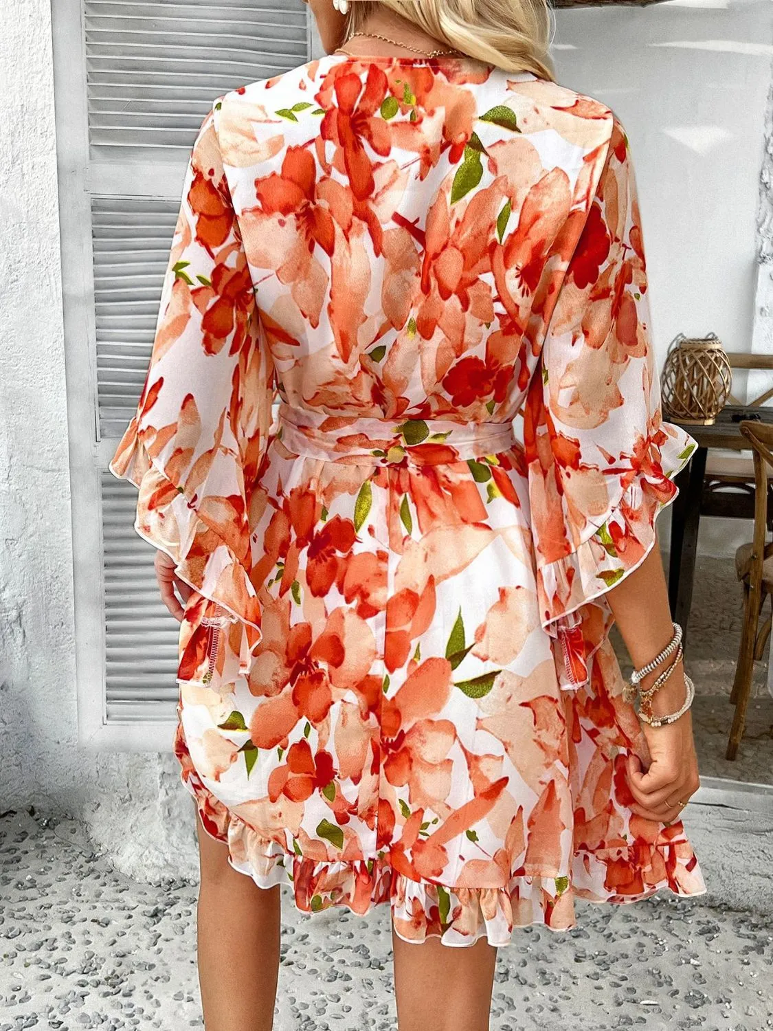 Devine Printed Surplice Ruffled 3/4 Sleeve Mini Dress