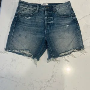 Distressed Denim Shorts