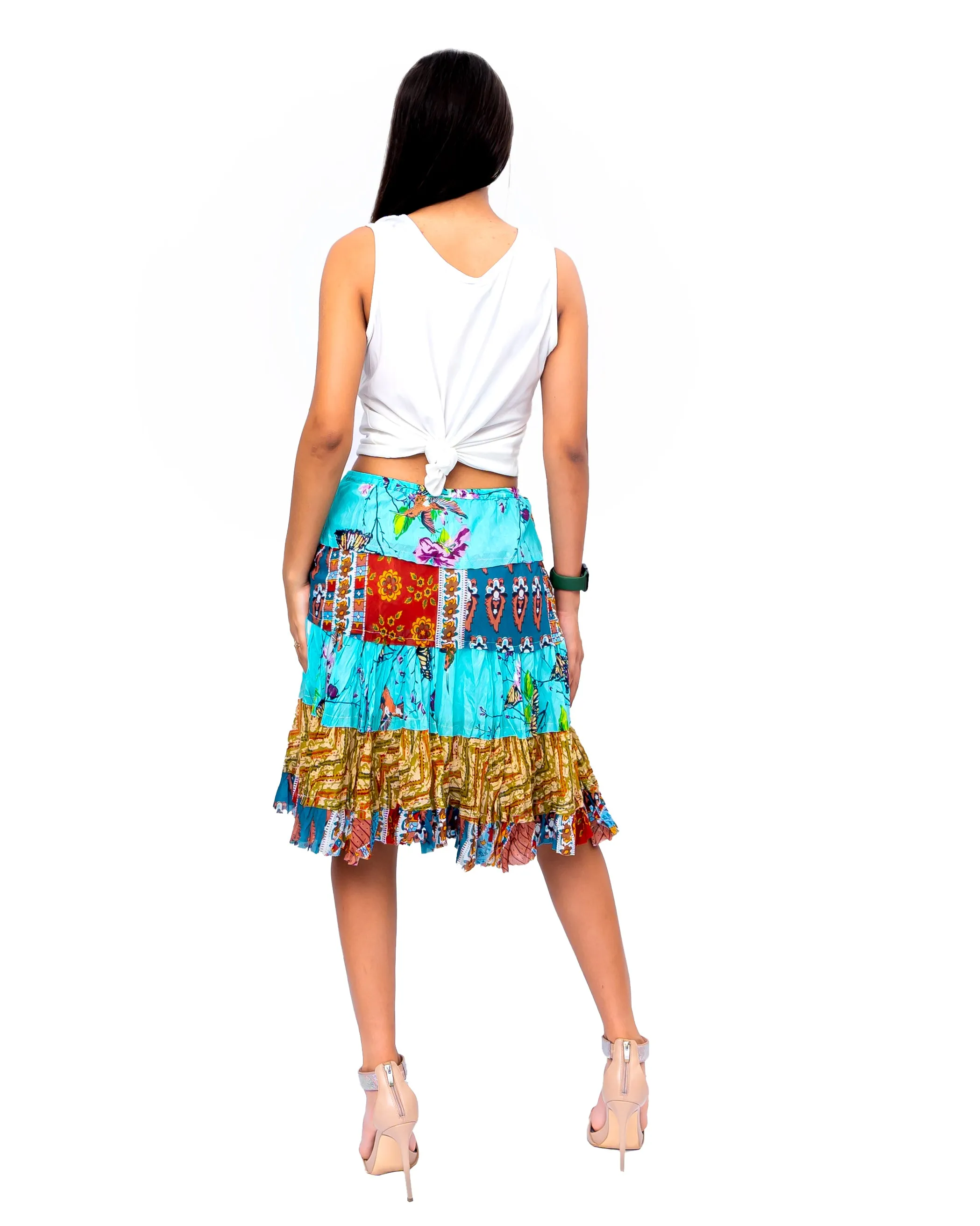 Five tiered Fabric mini ruffle skirt. In Multi.