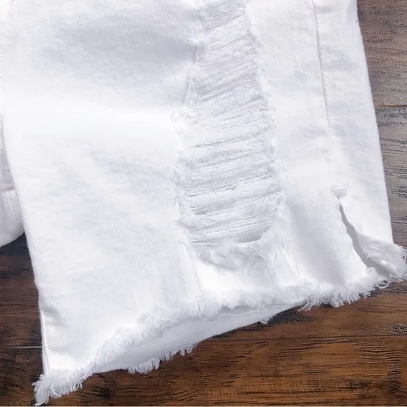 Good American • Destroyed Cutoff Denim Shorts White 004 ripped distressed jean