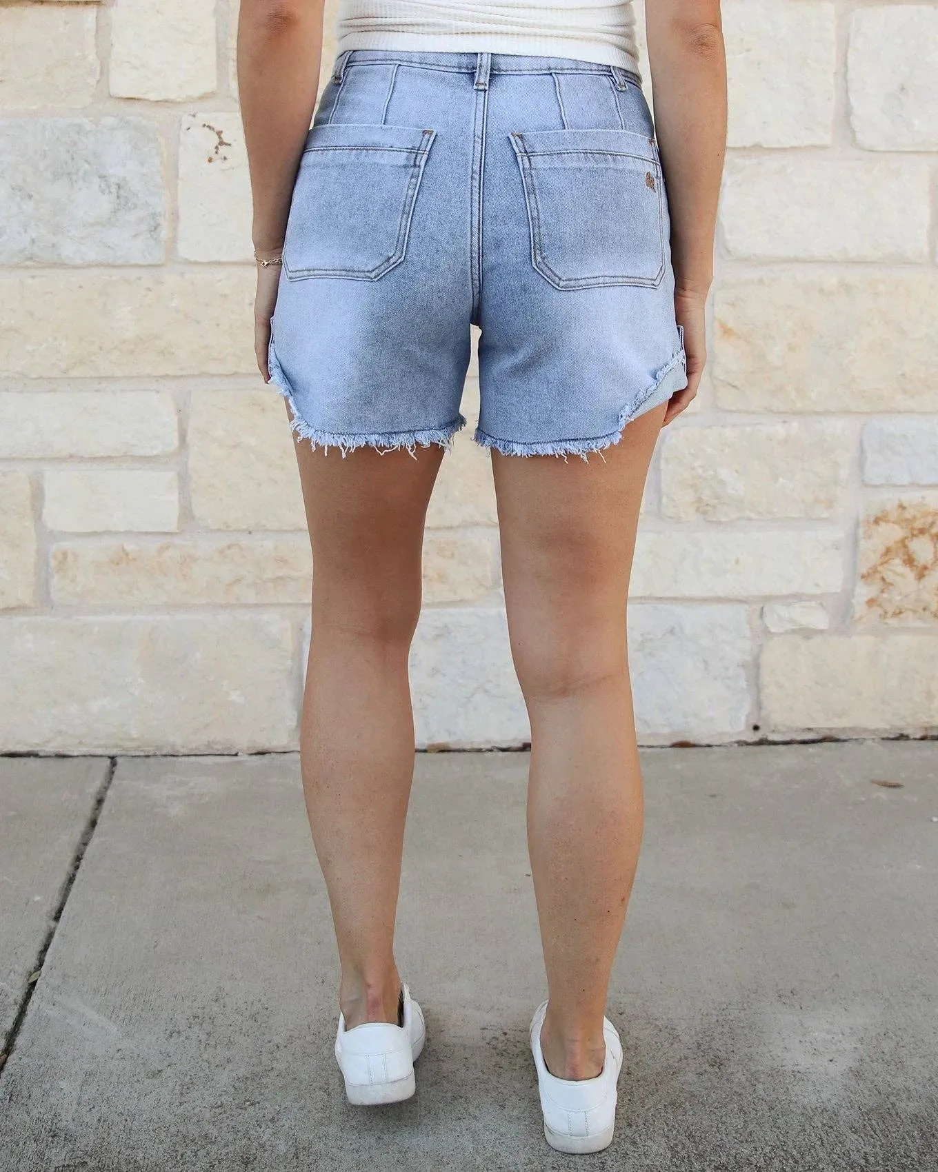 Grace and Lace Drop Hem Denim Shorts in Light Mid-Wash