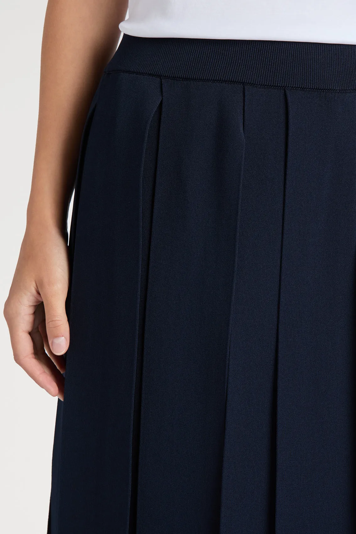 NAVY SKIRT FEATURING PANEL DETAILS