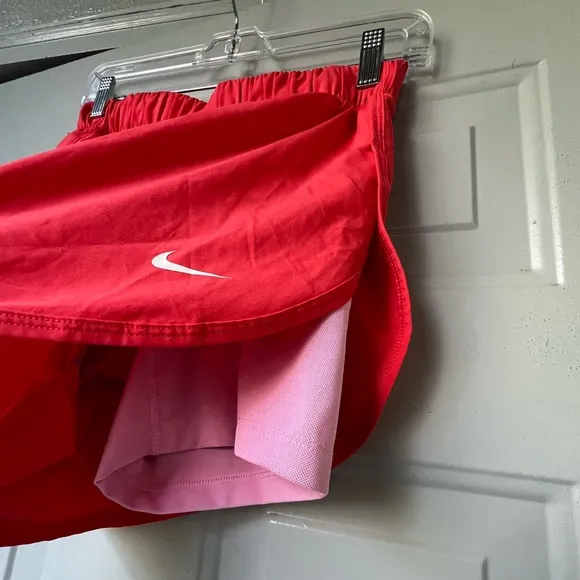 Nike Dri Fit Women’s running Orange shorts Size Medium