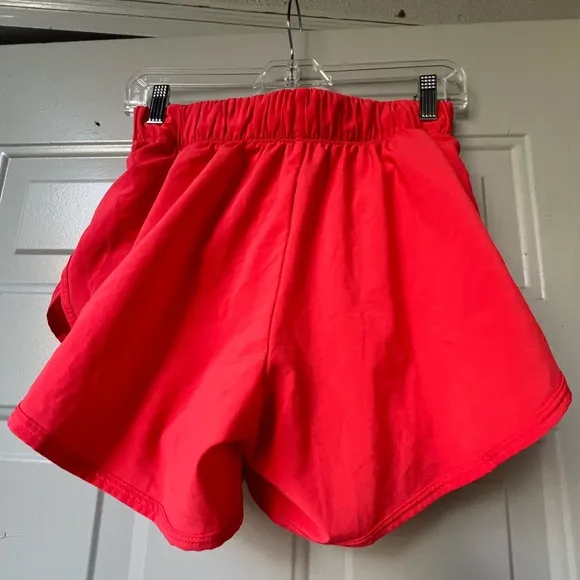 Nike Dri Fit Women’s running Orange shorts Size Medium